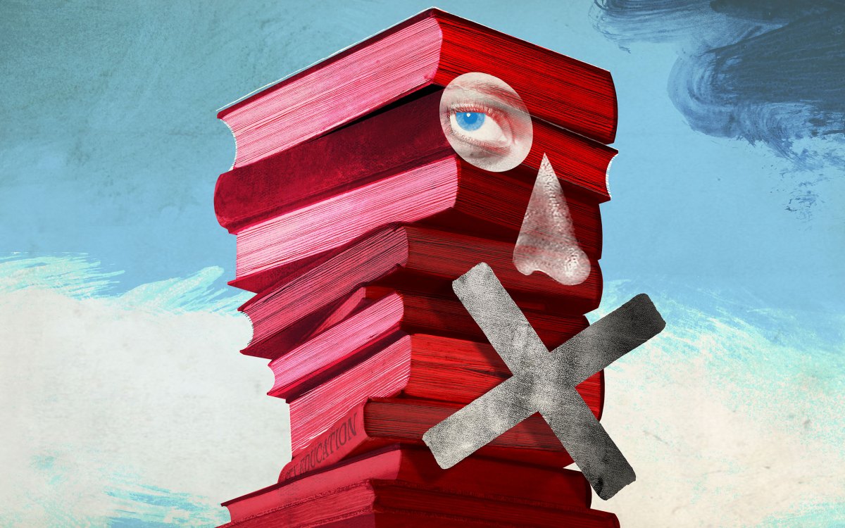Gagged face on pile of text books.