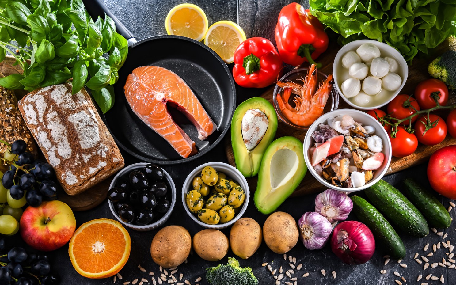Fish, vegetables, and other foods found in Mediterranean diet.