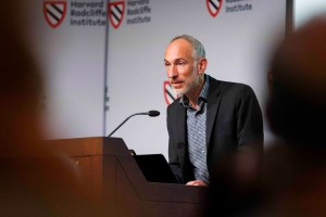 David Reich at lectern.