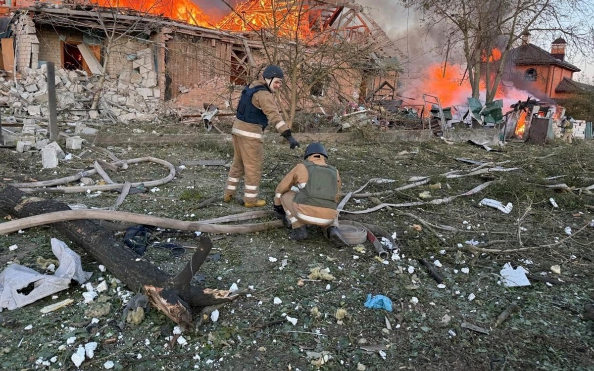 Ukrainian Emergency Services on Wednesday, Sept. 10, 2025, rescue workers put out a fire in a house destroyed by a Russian strike on a residential neighbourhood i