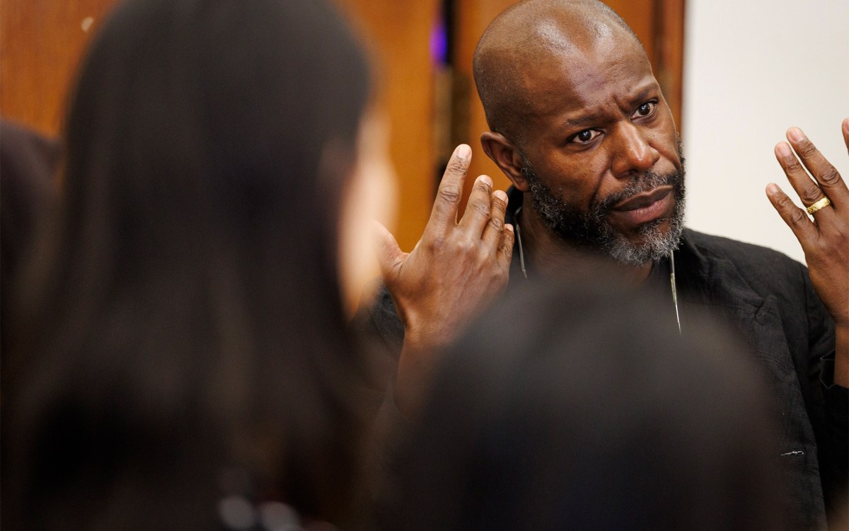 Steve McQueen (left) speaks at ArtsBites, an undergraduate luncheon and discussion series at the Office for the Arts.