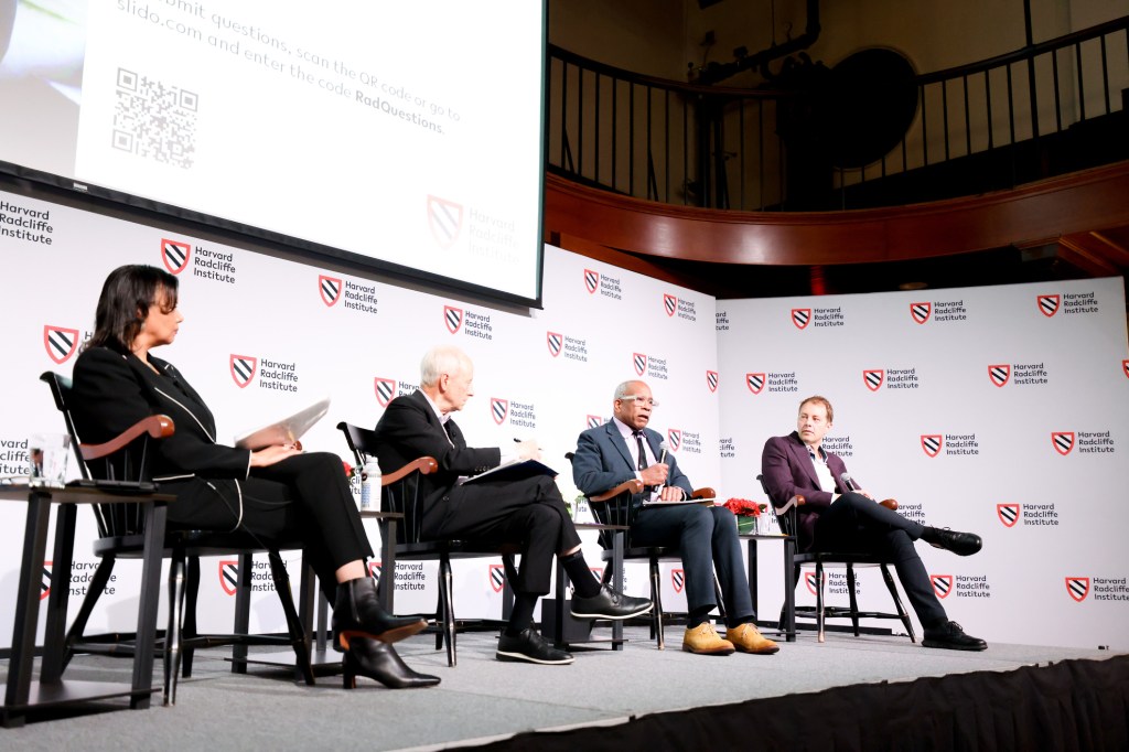 Panel moderator Tomiko Brown-Nagin (from left), Michael Sandel, Randall Kennedy, and David Deming.