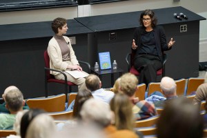 Nicole Rust speaking at Harvard Science Center.