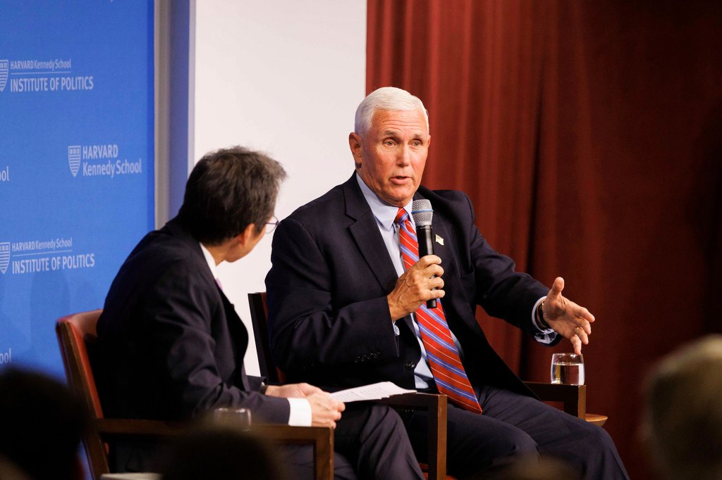 Mike Pence (right) and Archon Fung at the JFK Forum.