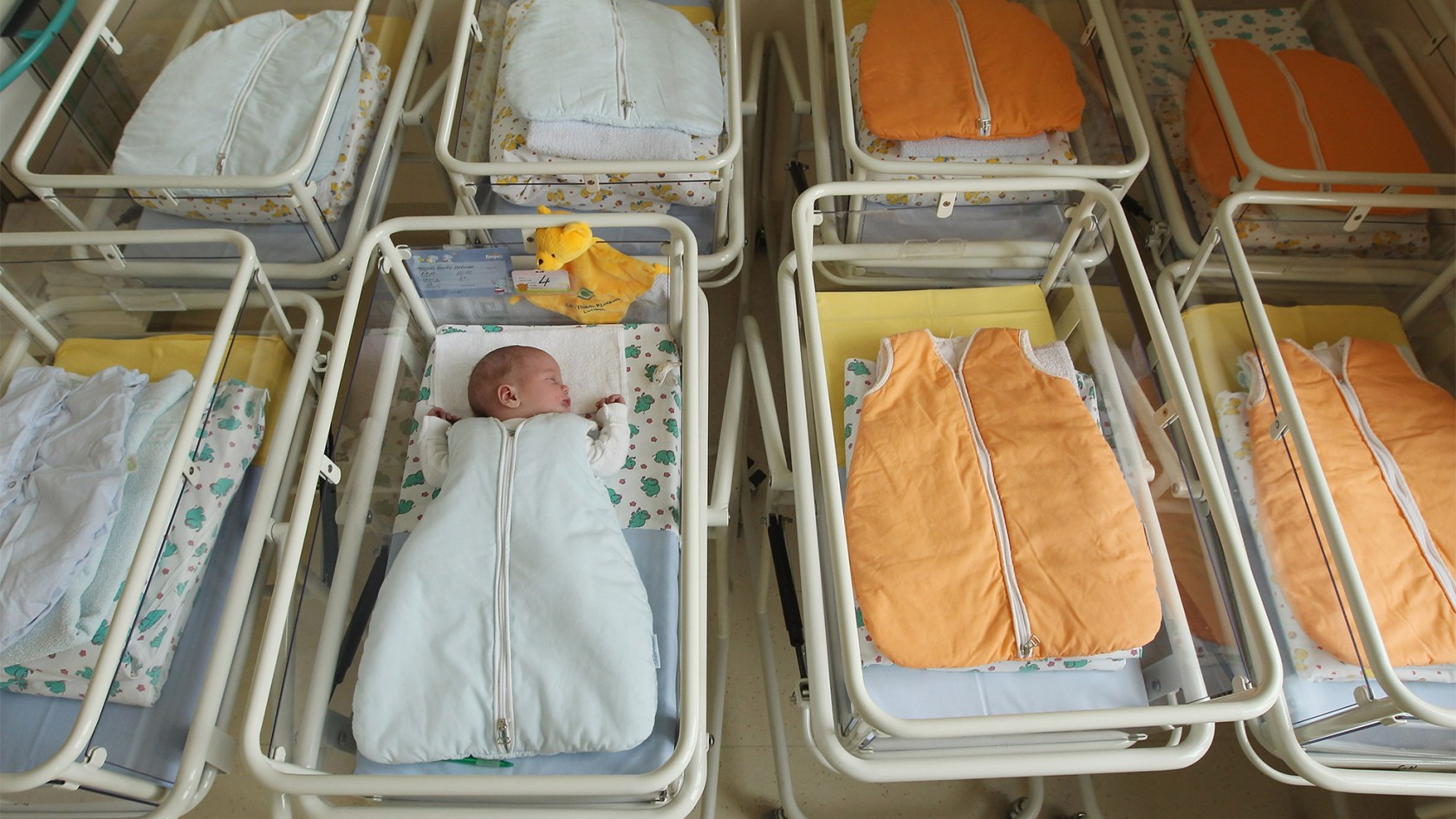 Single infant in nursery at hospital.