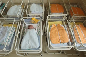 Single infant in nursery at hospital.