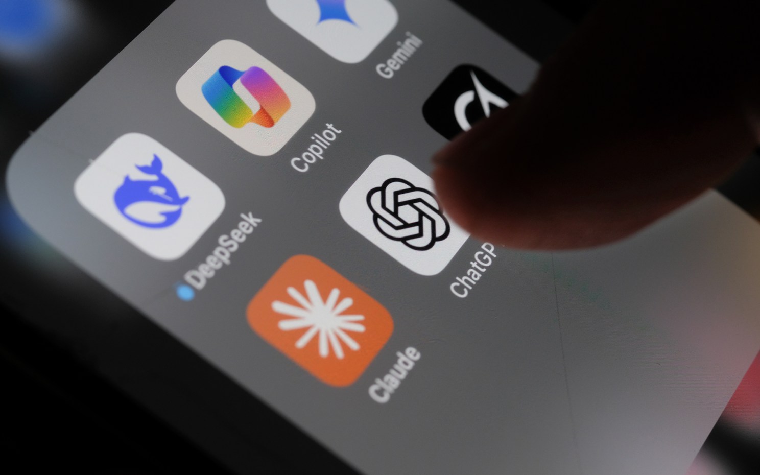 User taps on an AI app on cellphone.