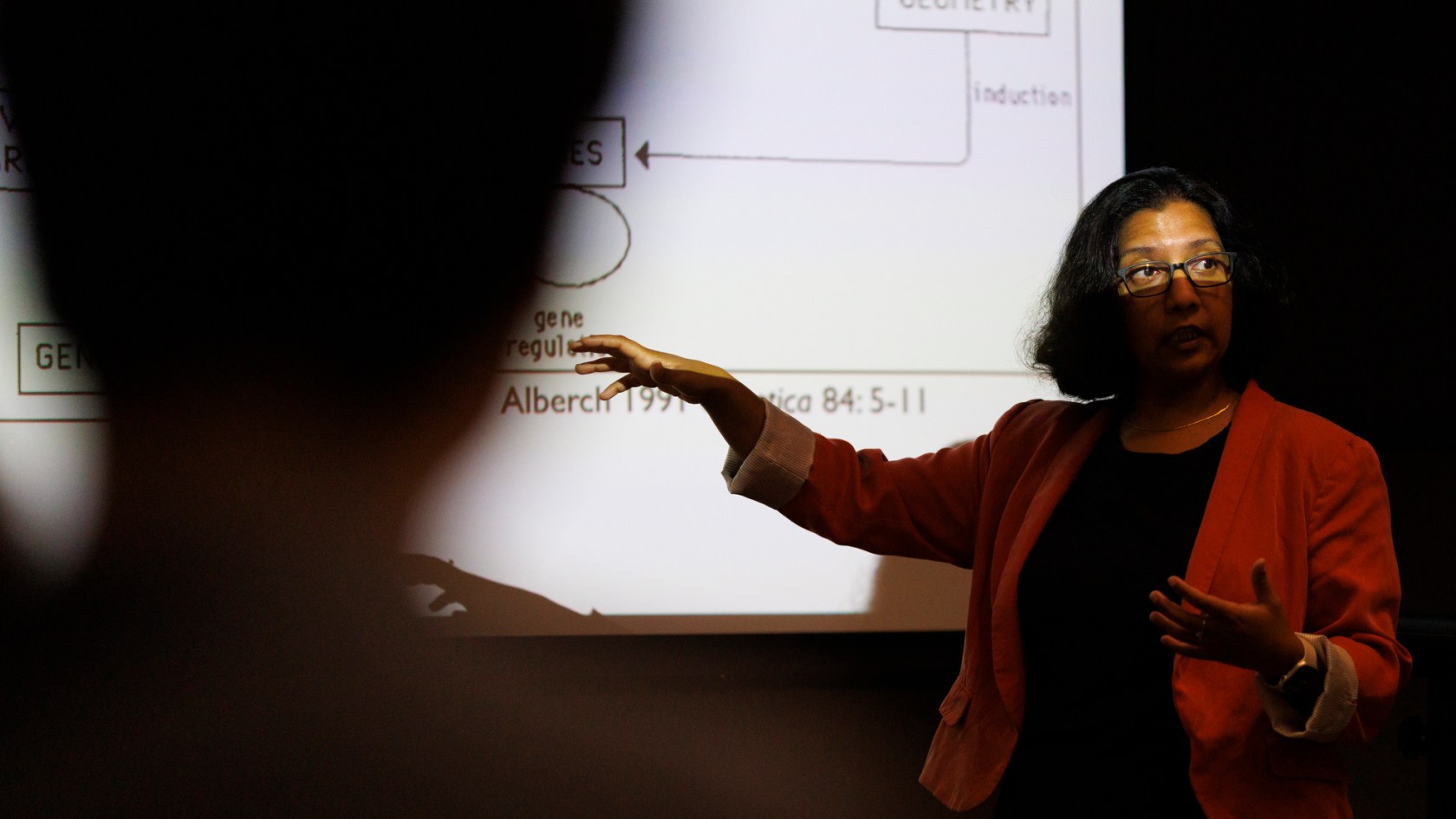 Mansi Srivastava giving a lecture.