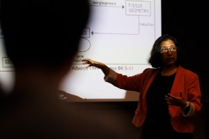 Mansi Srivastava giving a lecture.