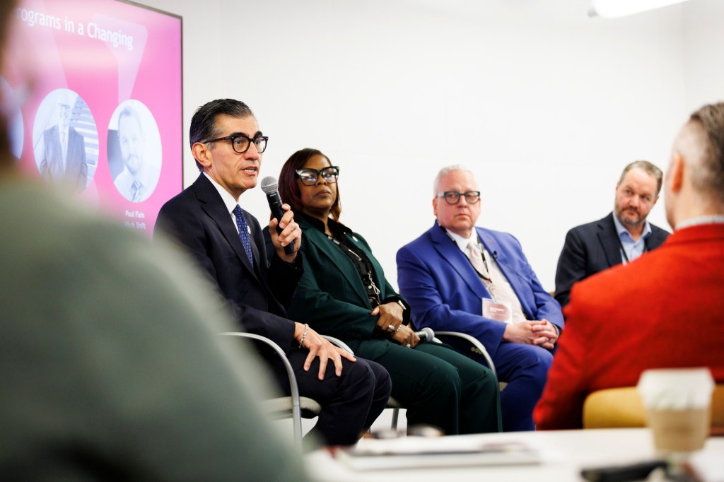 Mike Flores (from left), Deniece Thomas, Christopher Reber, and moderator Paul Fain.