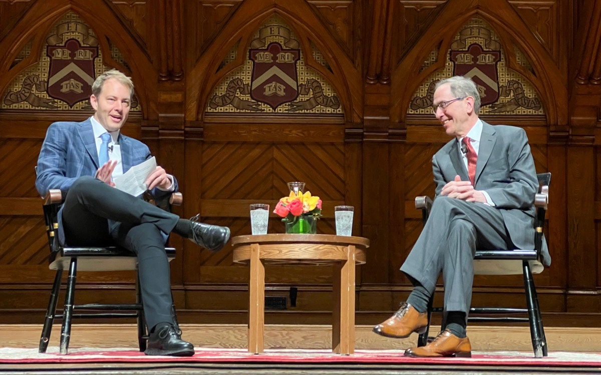 David Deming and Christopher Eisgruber.