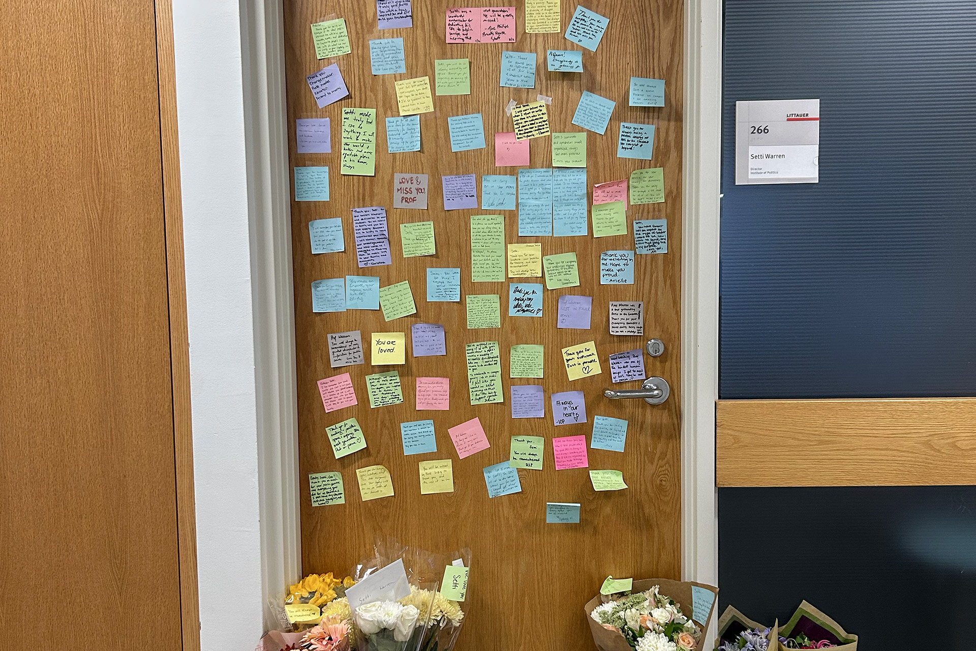 Notes and flowers outside Setti Warren's Harvard office.