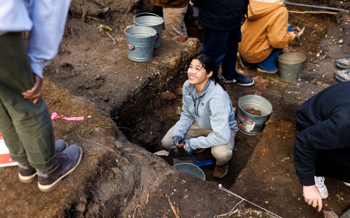 Student JJ Drummond talks with a partner.