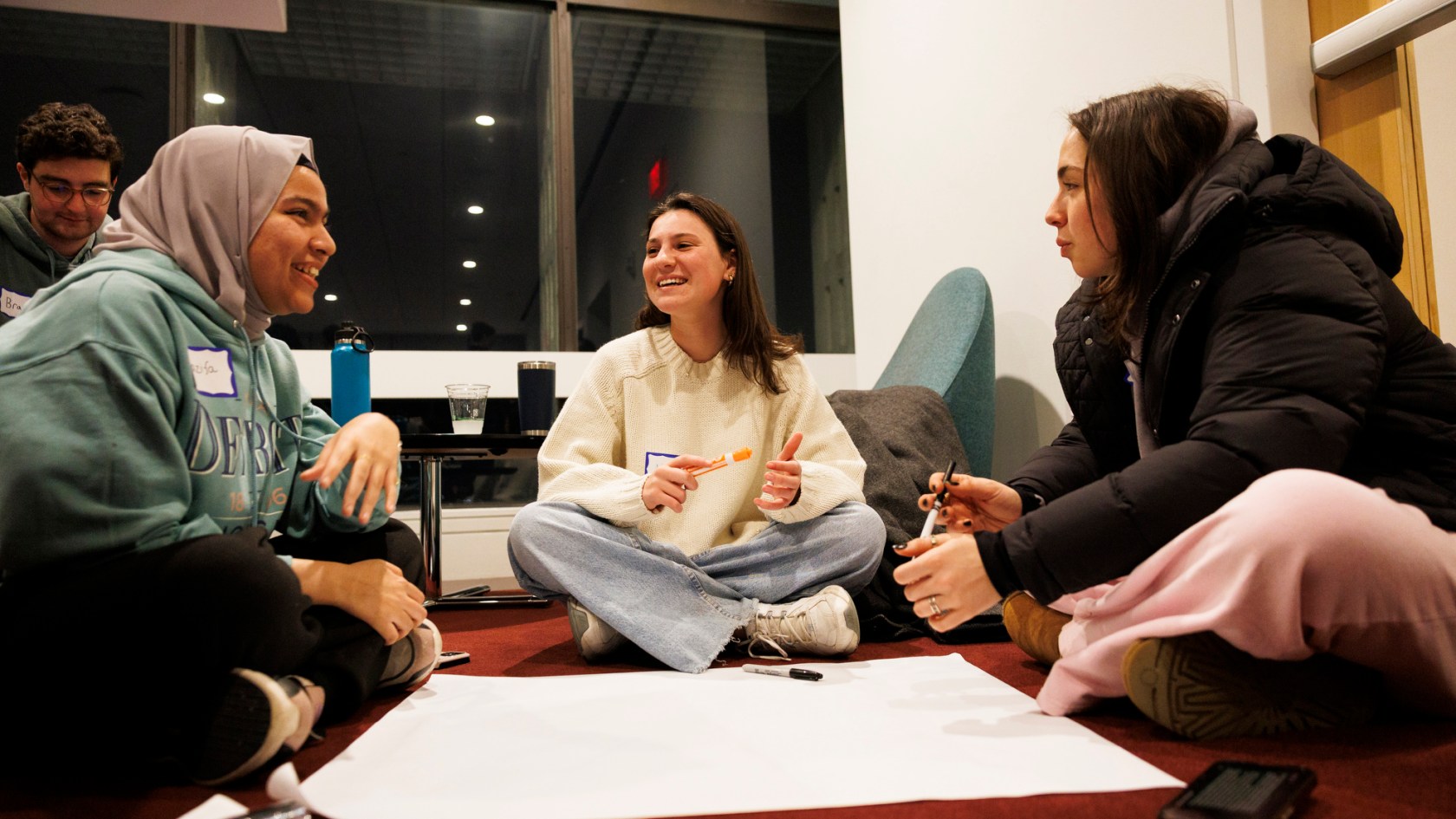 Nazifa Muntaha ’29 (from left), Noa Rone ’29, and Brooke Johnstone ’29