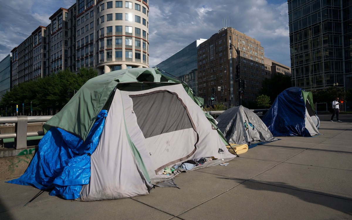 Homeless encampments are seen near Washington Circle.