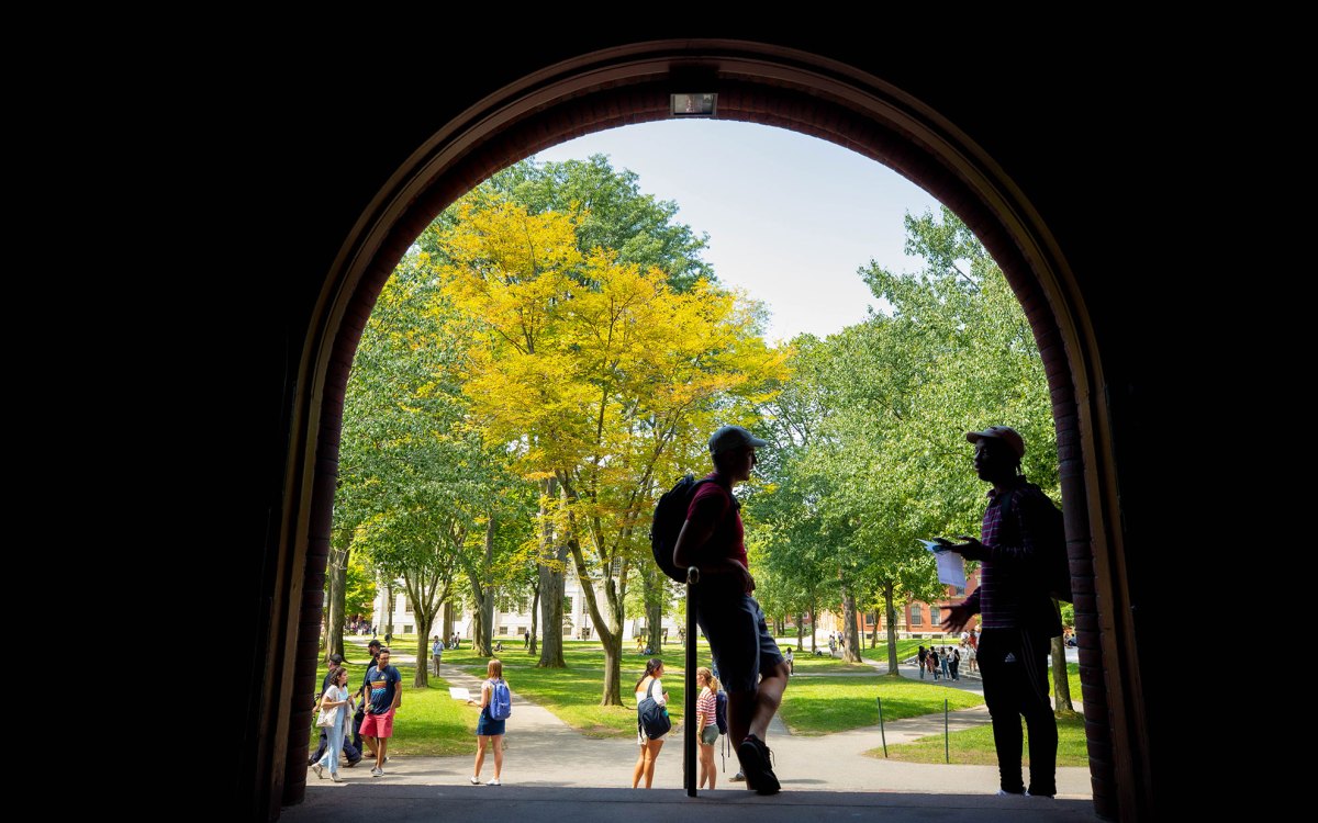 Students talking in Harvard Yard.