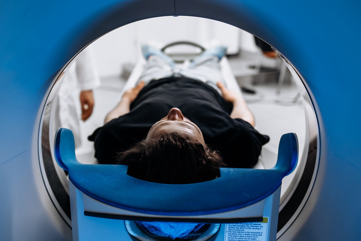 Patient inside MRI machine.