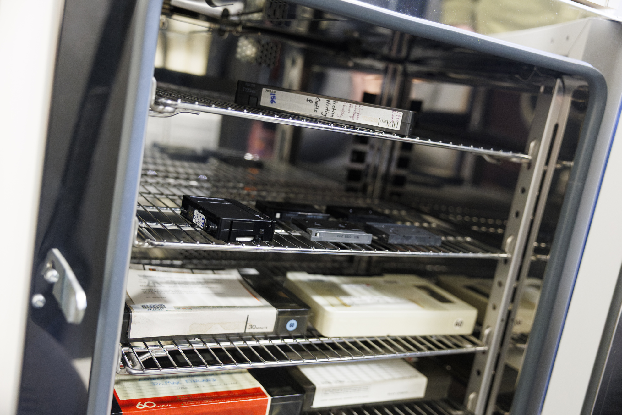 VHS tapes being heated in an oven, which helps with the preservation process. 

