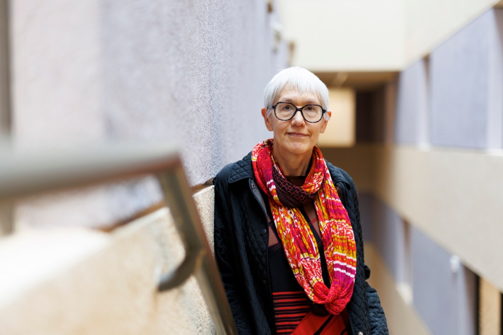 Ann Forsyth standing in a stairwell.