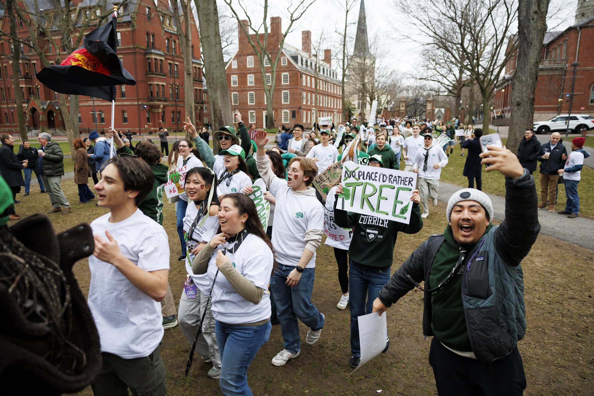 Students from Currier House arriving into Harvard Yard. 