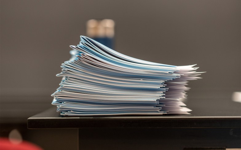 Stack of blue books.