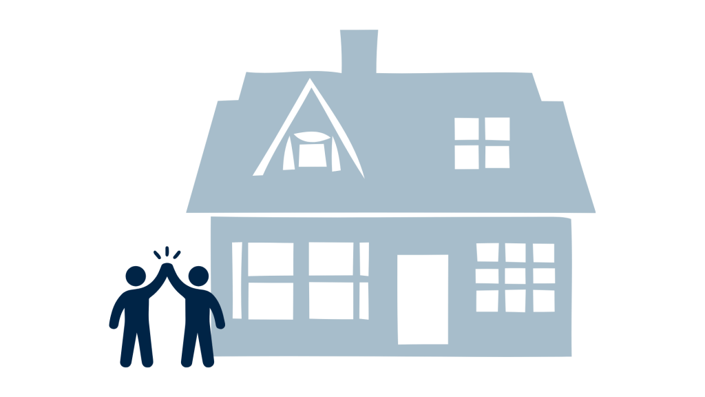 people celebrating in front of a home