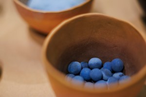 A pot of Egyptian Blue pigment pellets.