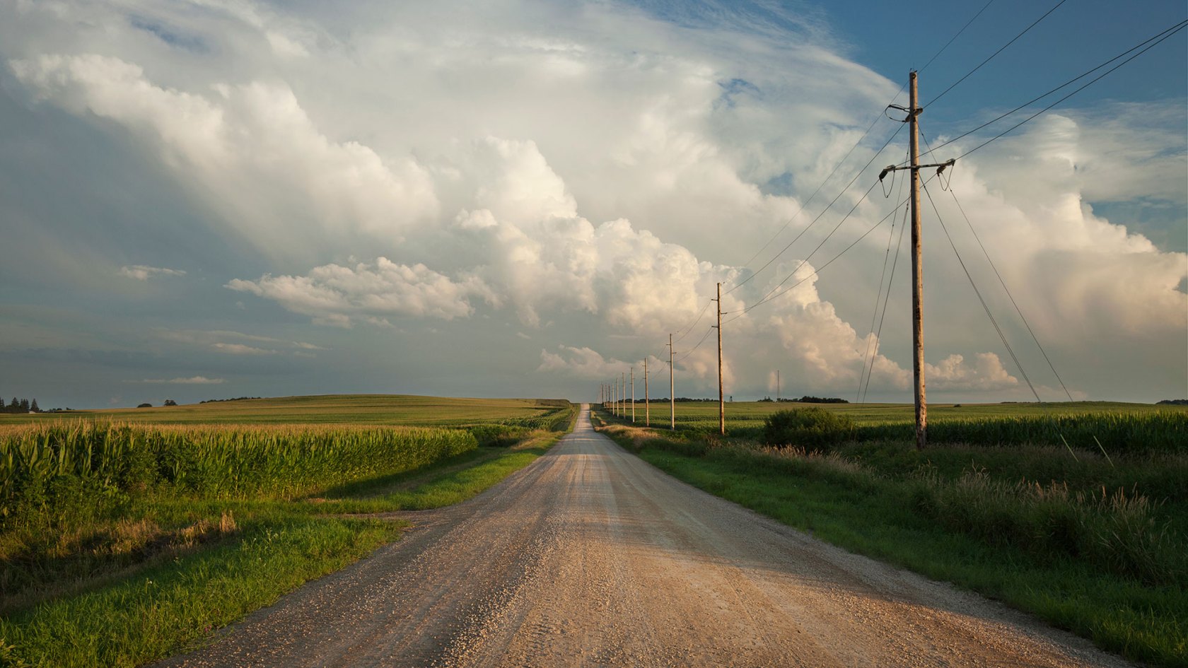 Rural road with dramatic clouds.