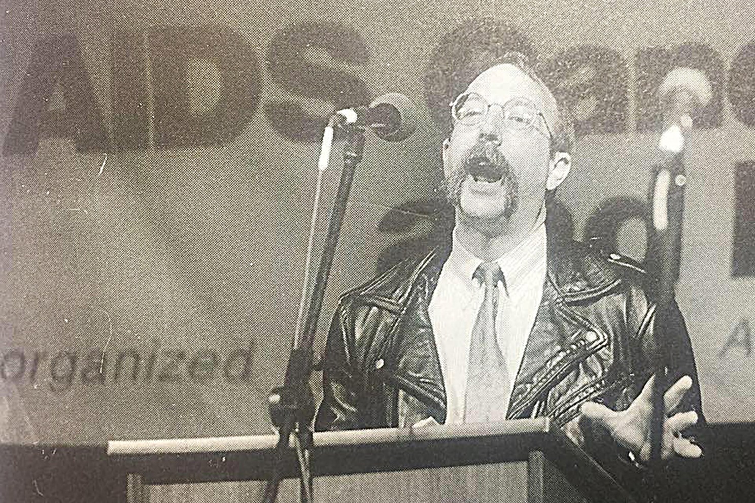 <em>The Rev. Jim Mitulski, former pastor at the Metropolitan Community Church of San Francisco, speaks at an AIDS memorial and march in 1994. </em>