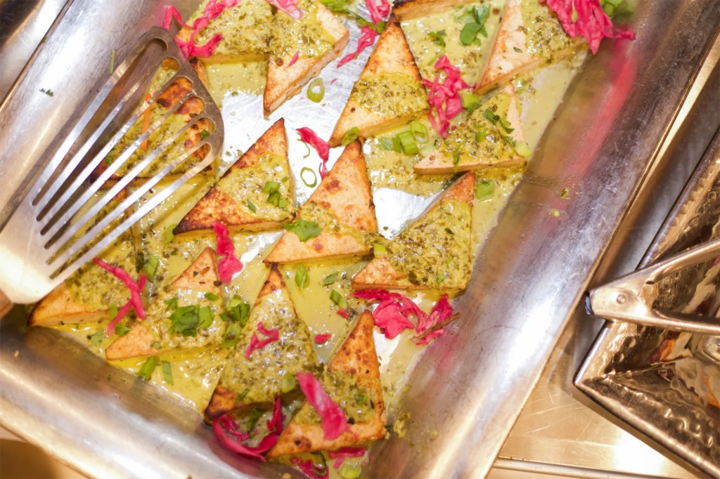 A pan of baked tofu ready to be served.
