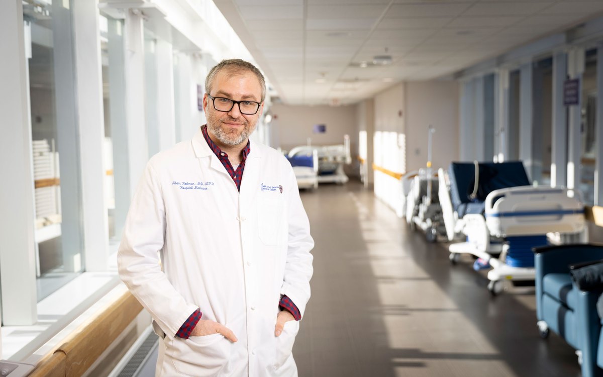 Adam Rodman standing in hospital corridor.