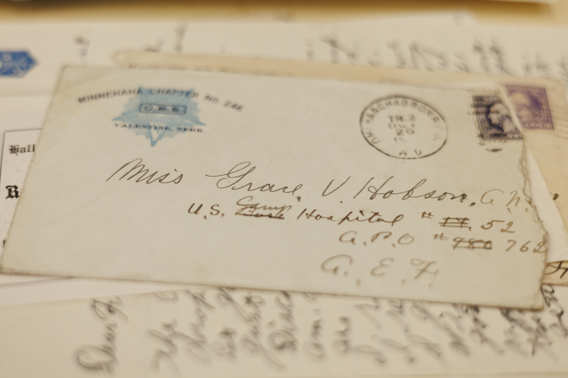 A series of hand-written letters are shown in the scrapbook of Hobson during her World War I service in France with the Army Nurse Corps.