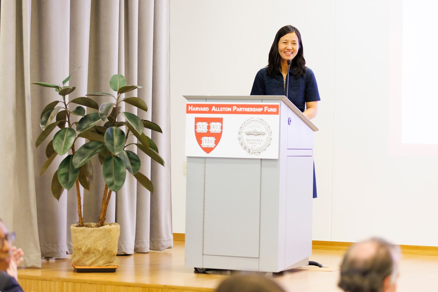 Mayor Michelle Wu at podium at the Harvard Ed Portal