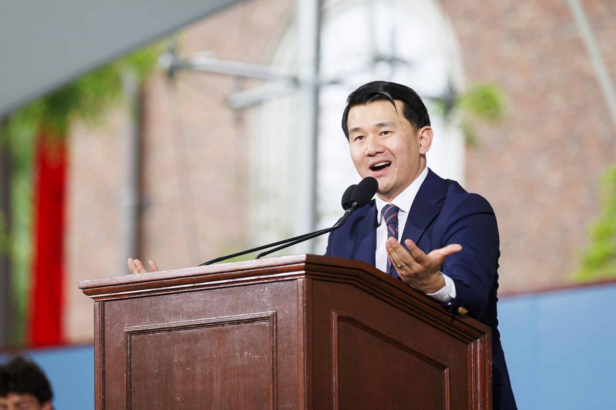 Ronny Chieng adresses Harvard seniors.
