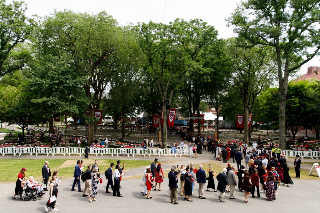 Alumni walk past Widener Library and into Tercentenary Theatre during the Harvard Alumni Day parade in 2025.