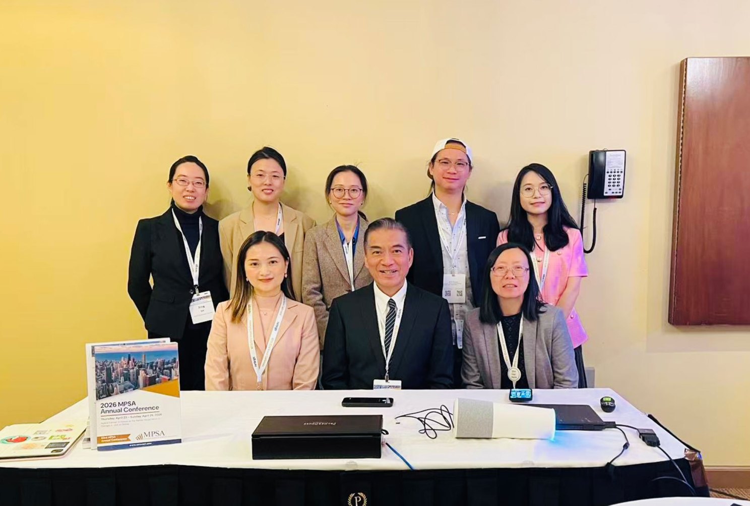 Group photos featuring Zhilei Wu, Rey-Sheng Her, Chunying Yue, Jing Ge, Xiaobei Li, Mimi Pi, Chenlin Cai, and Xingzi Liang were taken on-site after the first day session on April 25, 2026. All attended in person.