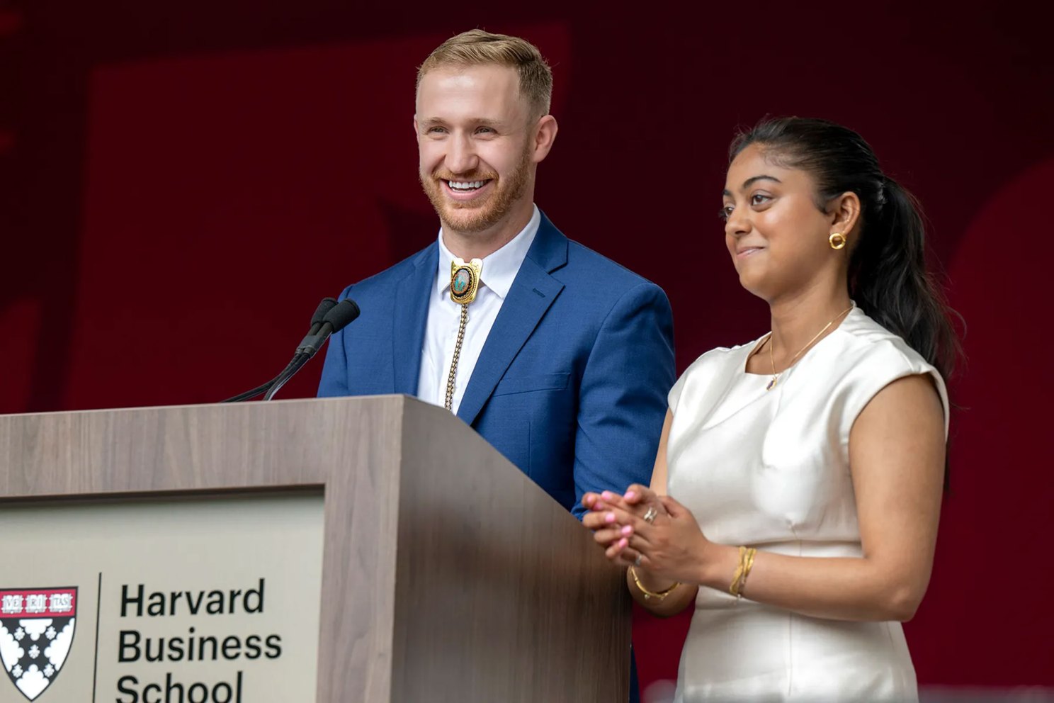 Jess Williams and Riddhi Sangam (Class Day co-chairs) address the audience.