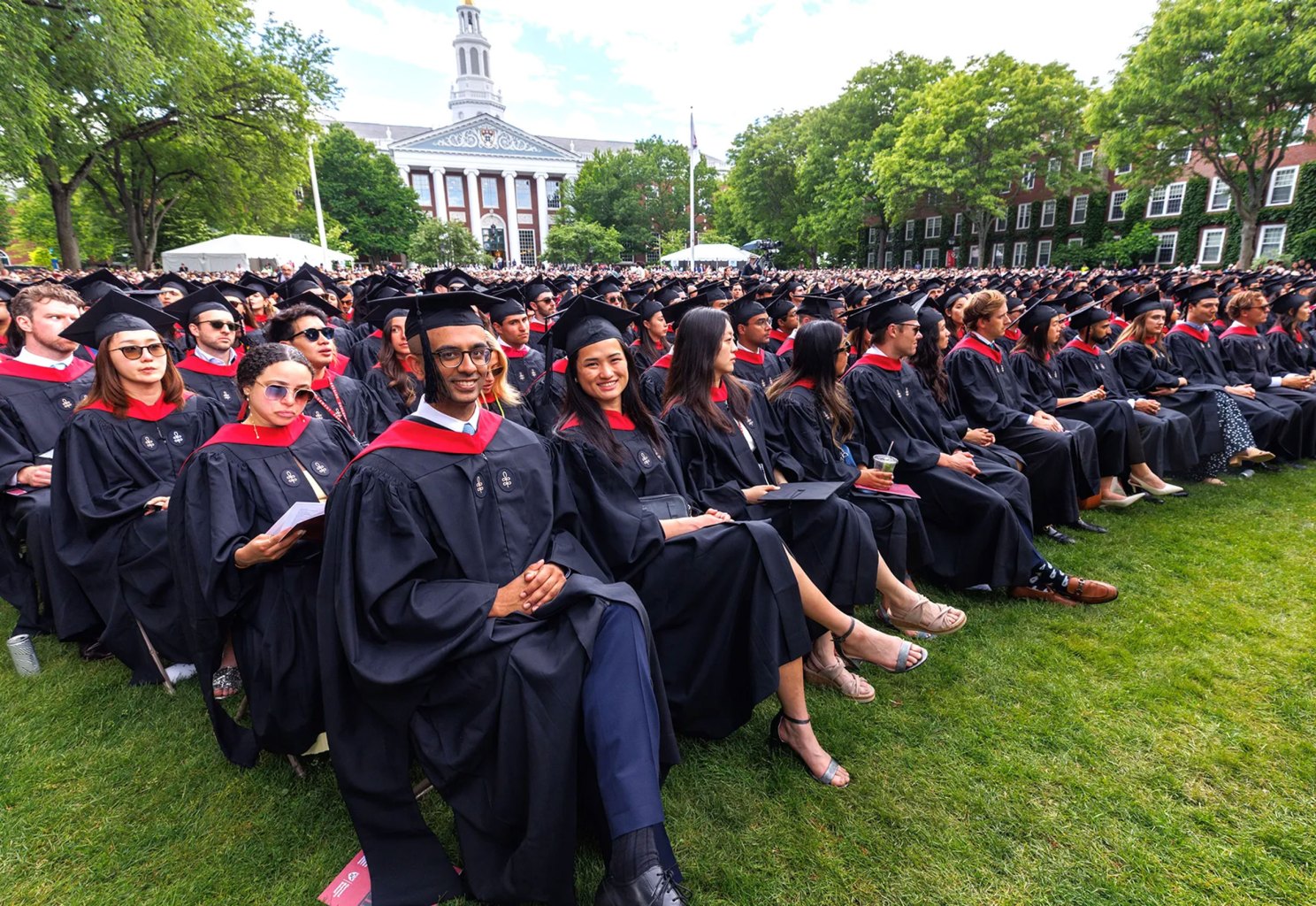 M.B.A. and doctoral students listening to Dean Srikant Datar’s address during the HBS Commencement. Photo by Russ Campbell
