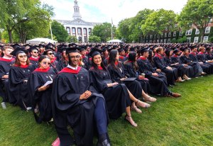 M.B.A. and doctoral students listening to Dean Srikant Datar’s address during the HBS Commencement. Photo by Russ Campbell