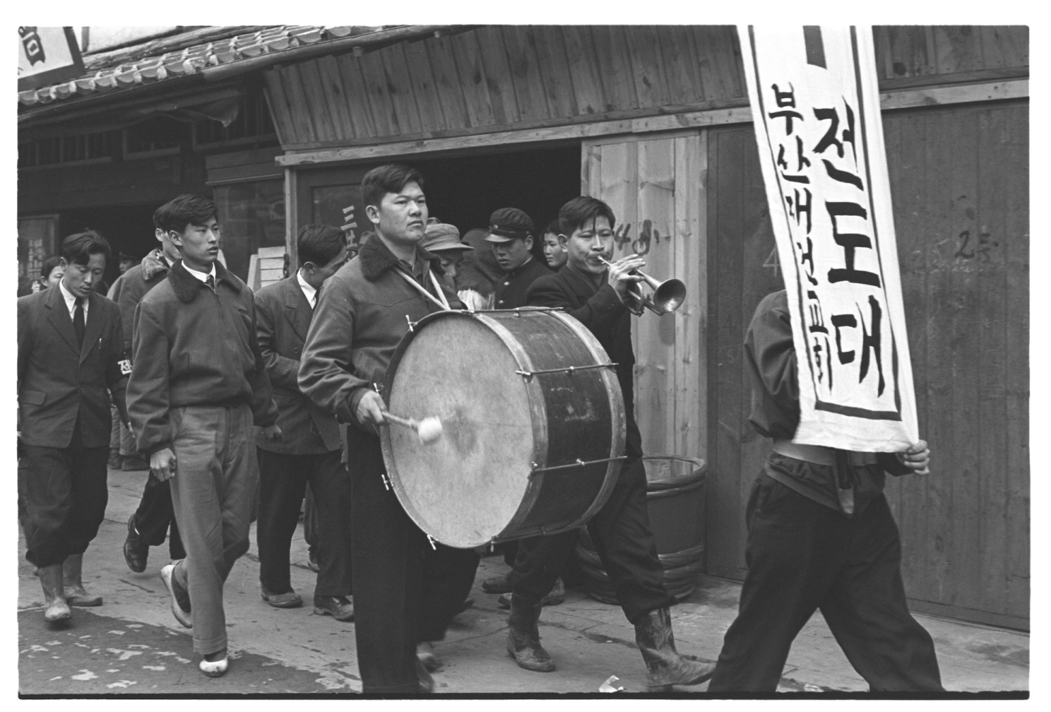Members of a band perform on a street in Pusan.