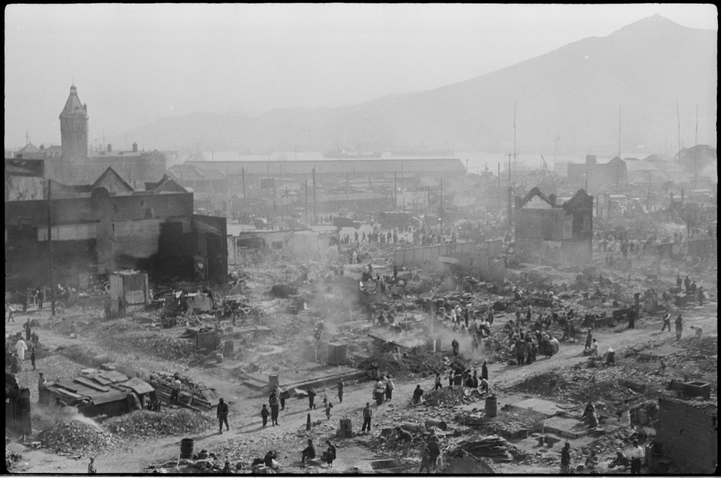 A black-and-white photo of Pusan after a significant fire.