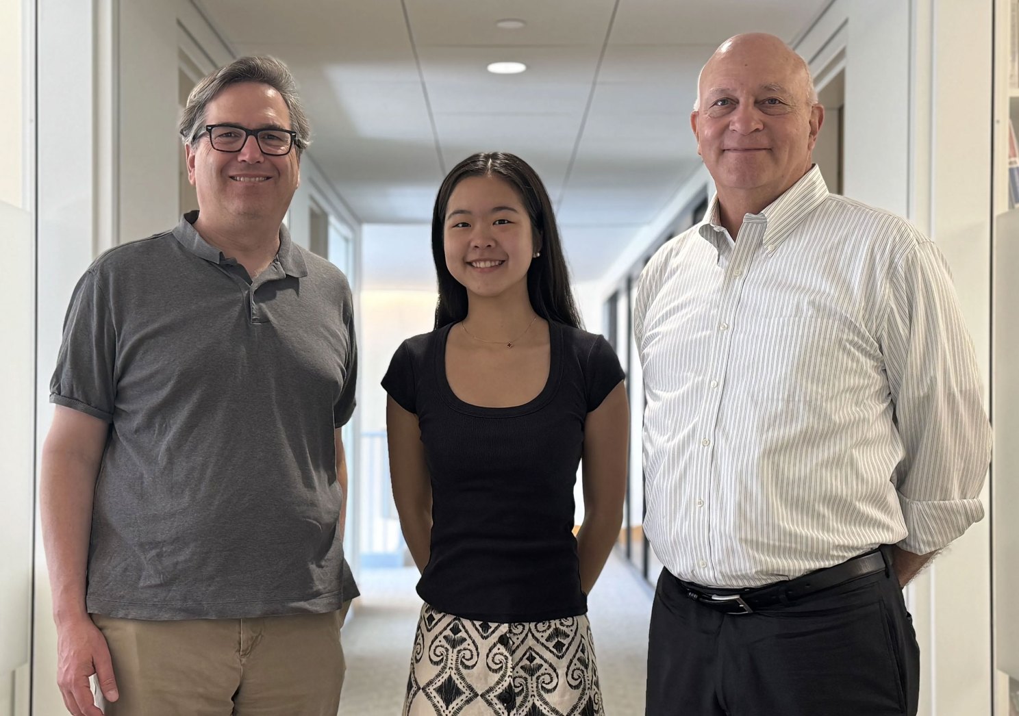 2026 Dunlop Undergraduate Thesis Prize winner Bona Yoo (center) with M-RCBG Director Jason Furman (left) and M-RCBG Co-Director John Haigh. Photo by Claire Byrne