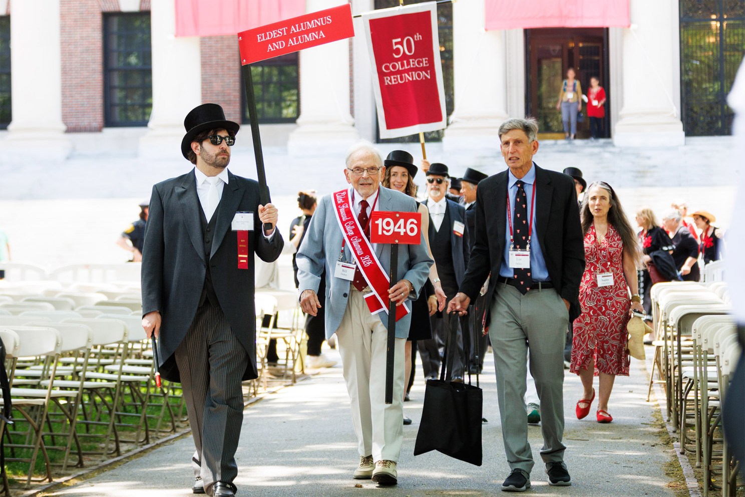 Bill Dubey ’46, the eldest male Harvard College alumnus present, processes into Tercentenary Theatre.