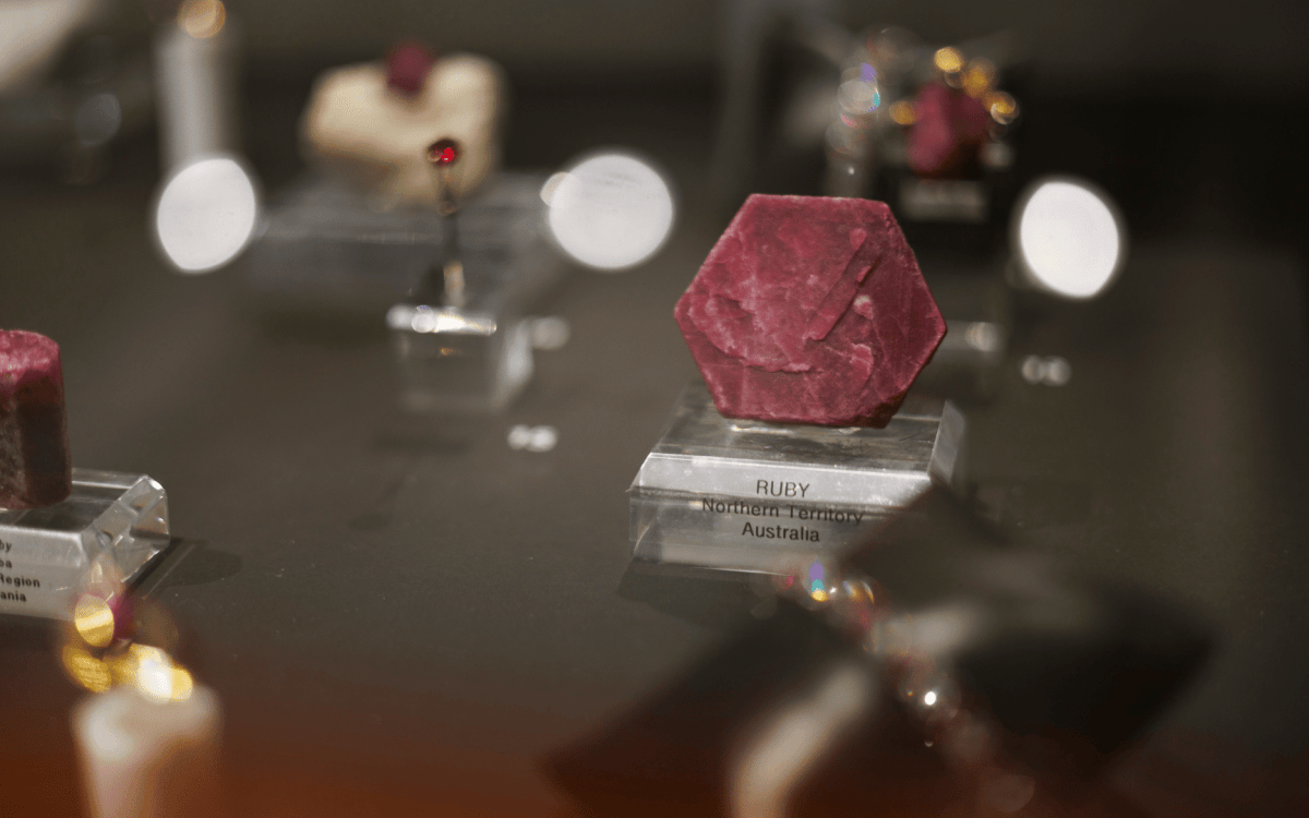 close up of rubies in a display case