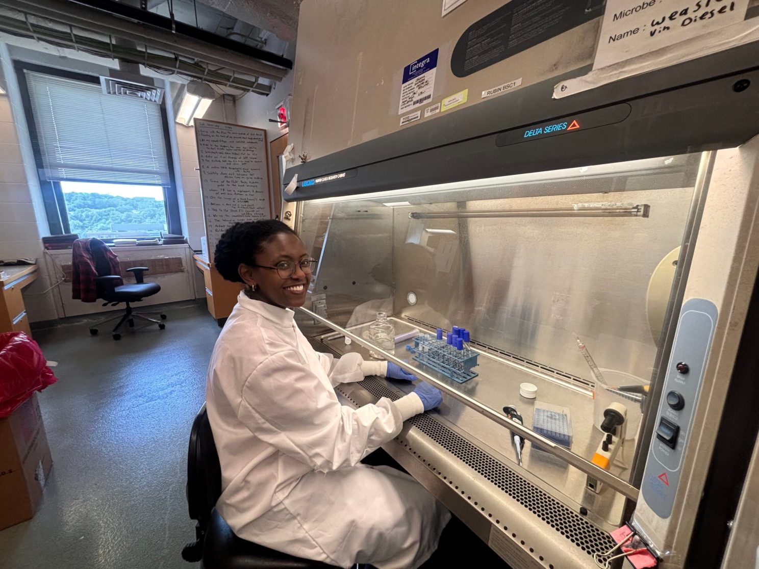 Young woman in lab coat in a laboratory