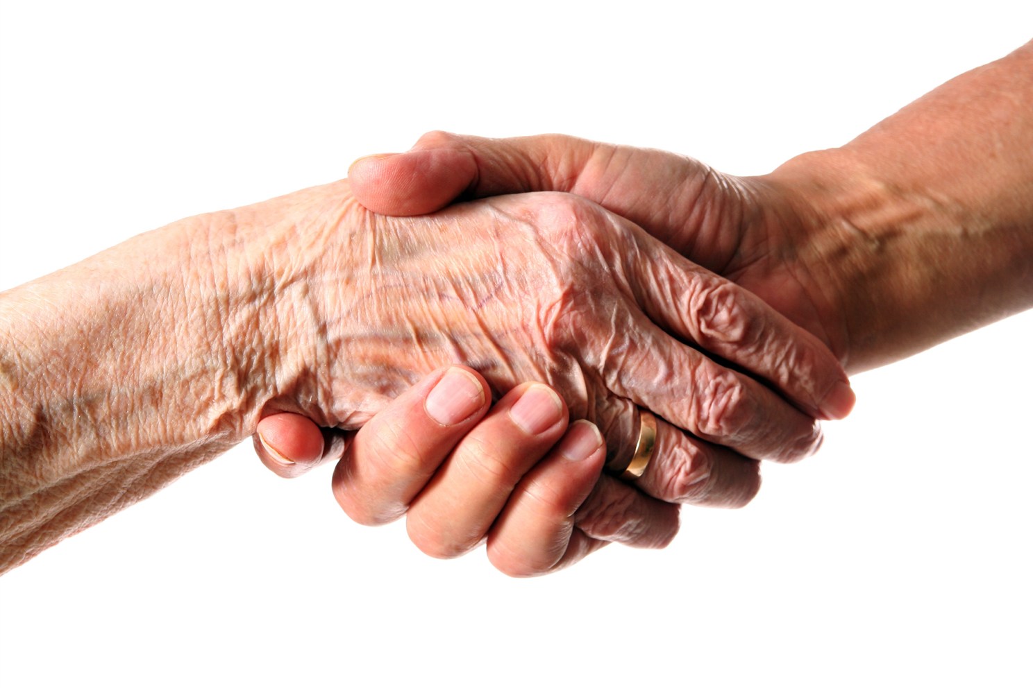 Wrinkled hand clutching a younger hand.