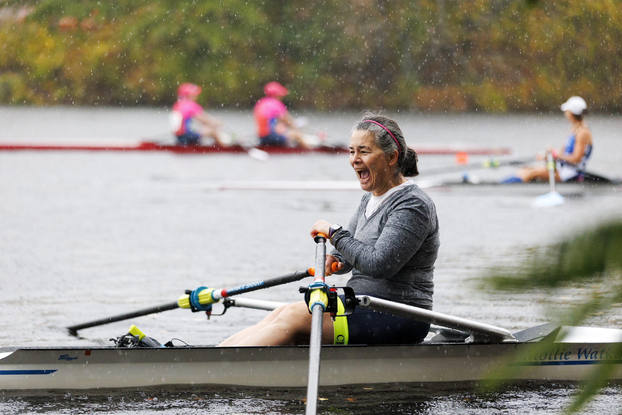 An overjoyed rower sings a rendition of “Singin' in the Rain” while they make their way down river.
