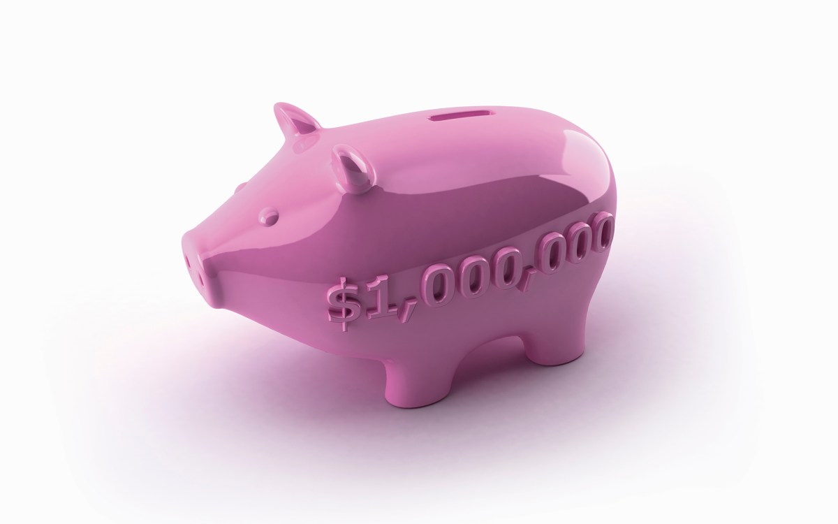 One million dollars number on side of pink piggy bank. Illustration by Dave Higginson/Ikon Images